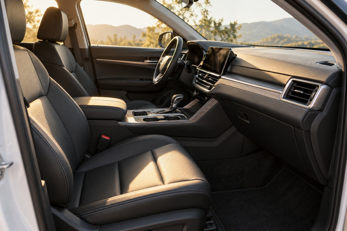 Illustrative sunlit SUV interior with clean charcoal seats.